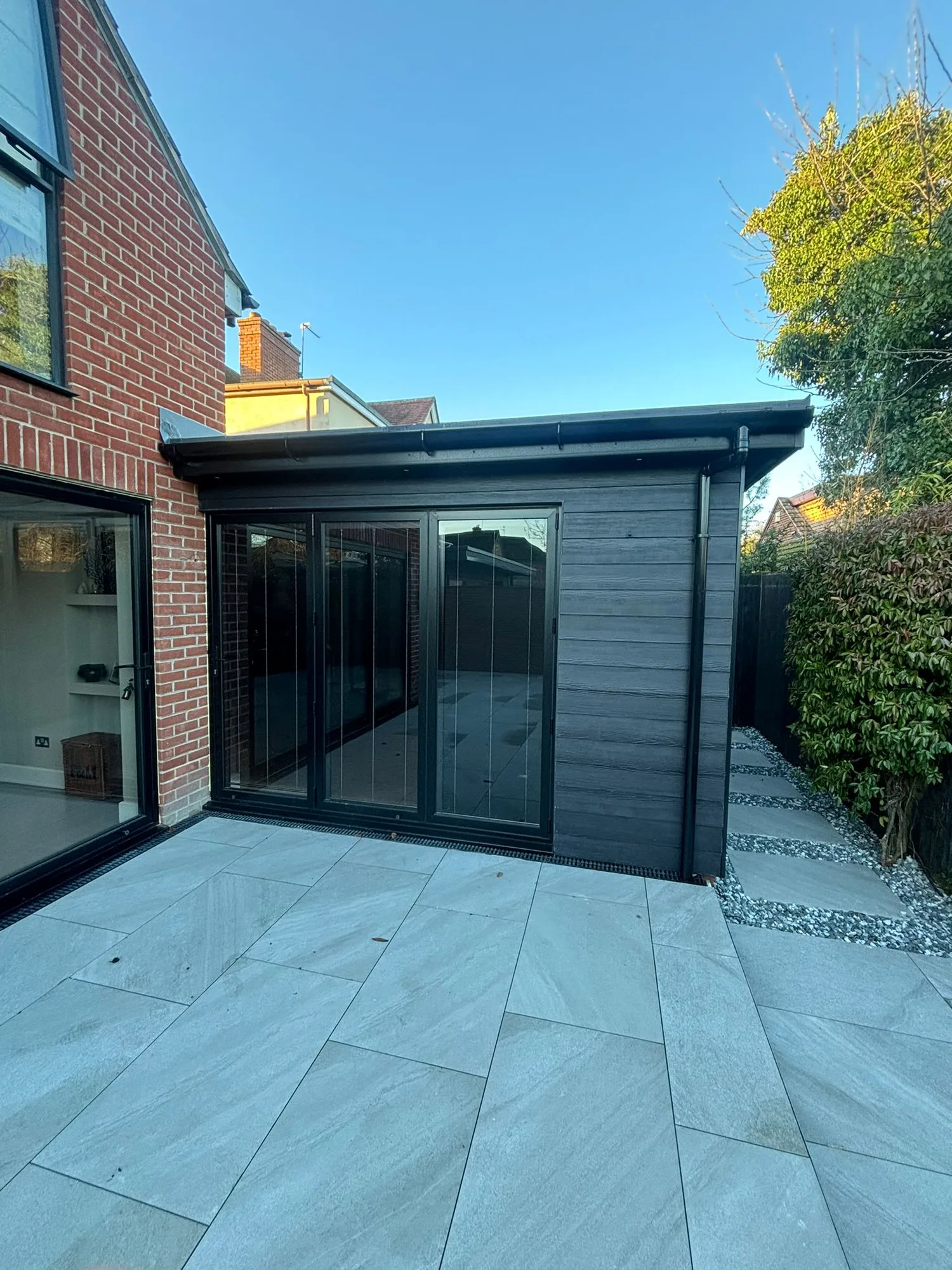 Composite clad extension with anthracite bifold doors in Essex
