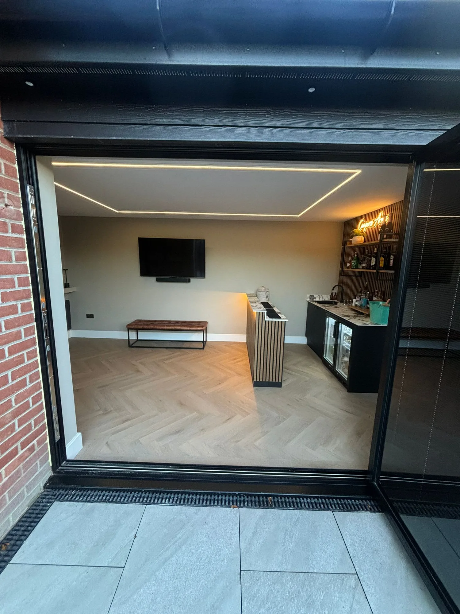 Interior lounge and bar of a garden room extension in Essex